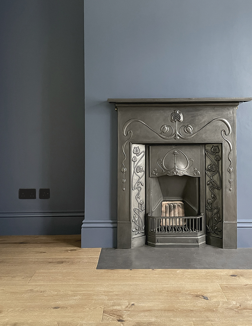 Original cast iron fireplace, fully restored