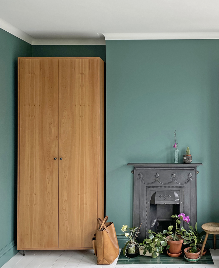Green bedroom, with Elm wardrobes and fully restored cast iron fireplace