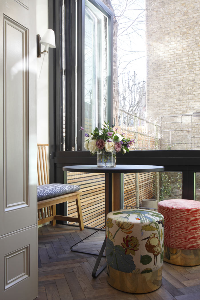 Additional breakfast room at the rear of the house, with bifolding windows onto garden area.