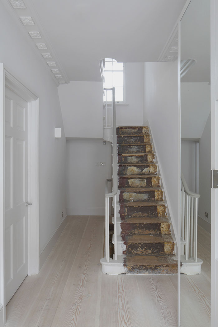 Entrance hall with Dinesen floor, full boards. Historic details and features fully restored, with historic staircase.