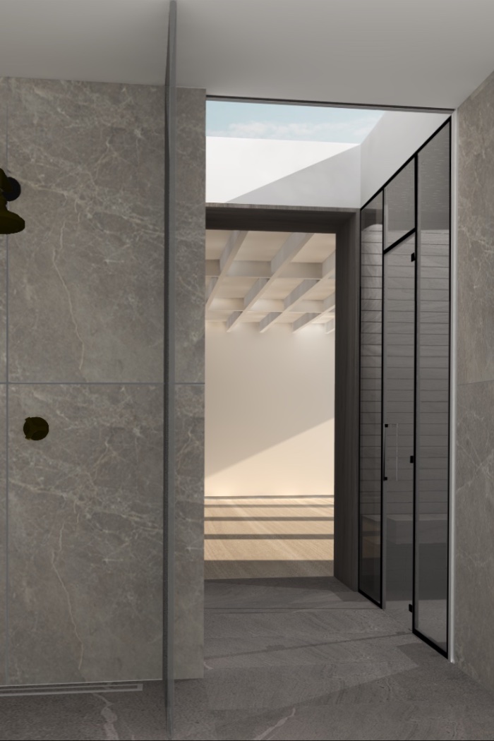 Ancillery spaces to new gym, showing bathroom and change area, glazed timber lined sauna, top lit circulation space, through to the large gym space.